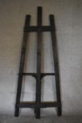 A large black painted wooden easel. H.193 x 73cm (Property of the late Jacqueline Morreau 1929-2016)