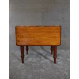 A 19th century pine country dining table with drop flap and draw pull action. H.74 x 60cm