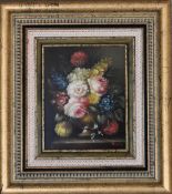 A gilt framed oil on, still life flowers. 39cm x 43cm.
