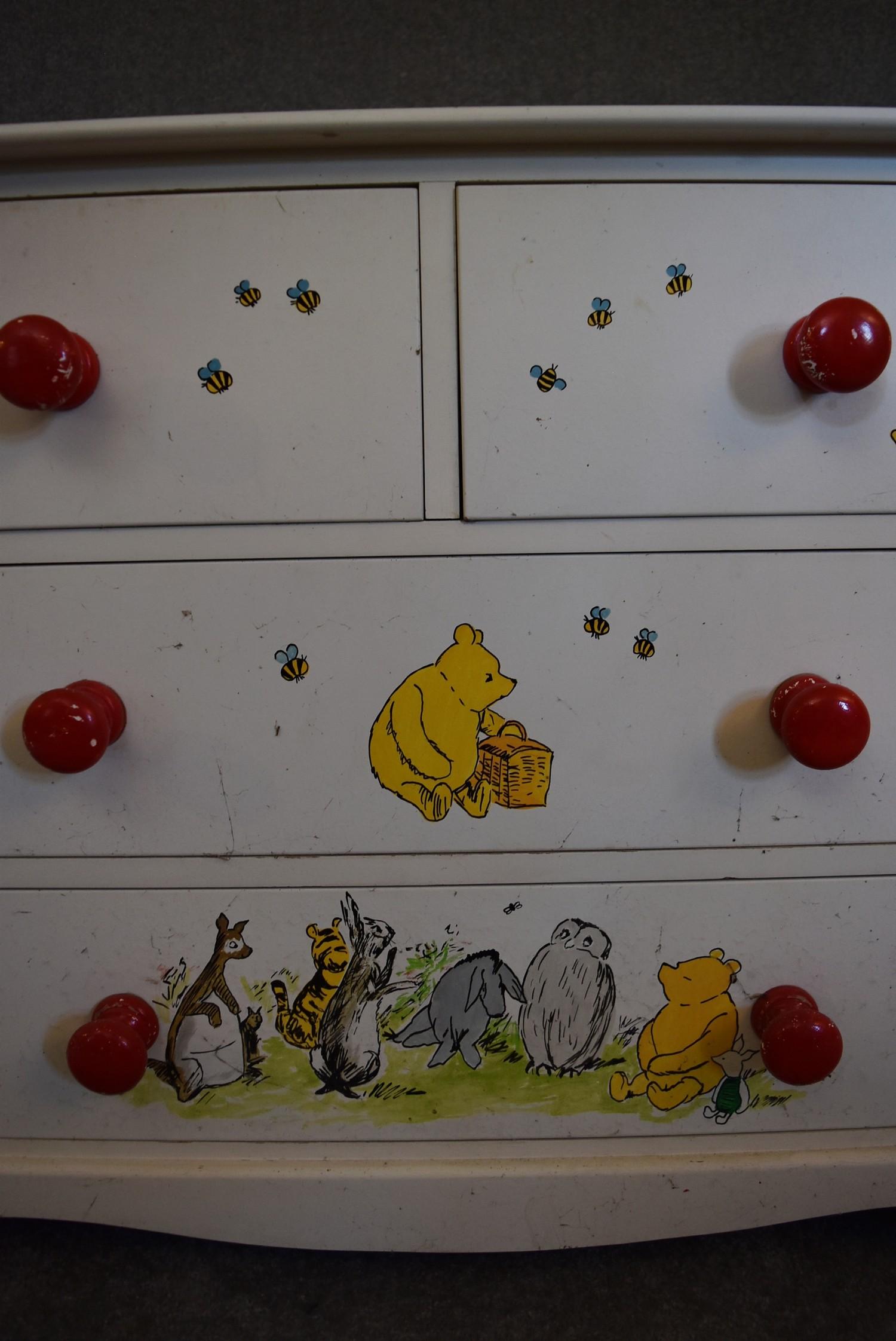 A pair of white painted pine chest of drawers with two short over two long drawers. Decorated with - Image 9 of 12