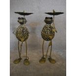 A pair of metal work garden bird tables in the shape of frogs. H.83cm
