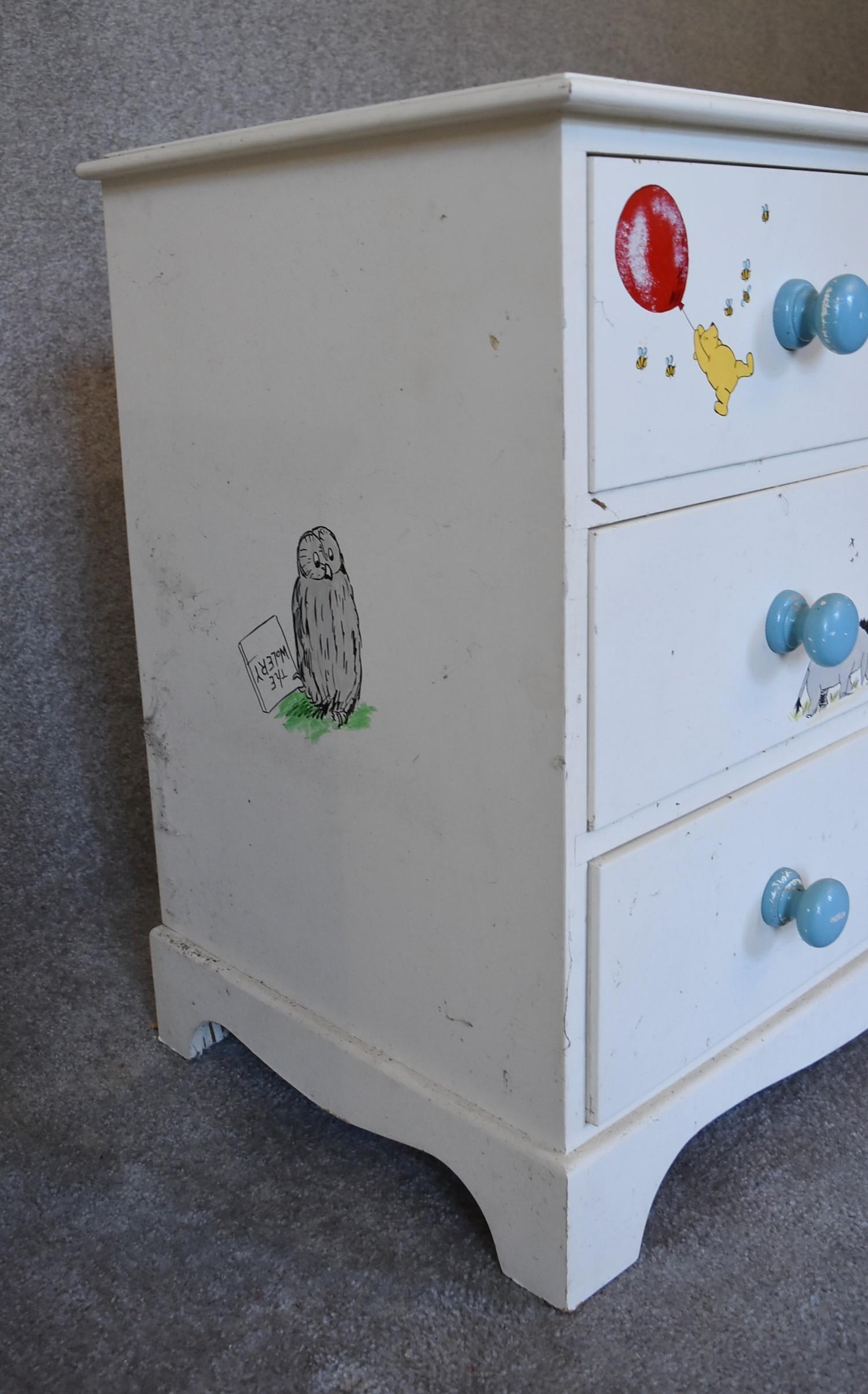 A pair of white painted pine chest of drawers with two short over two long drawers. Decorated with - Image 6 of 12