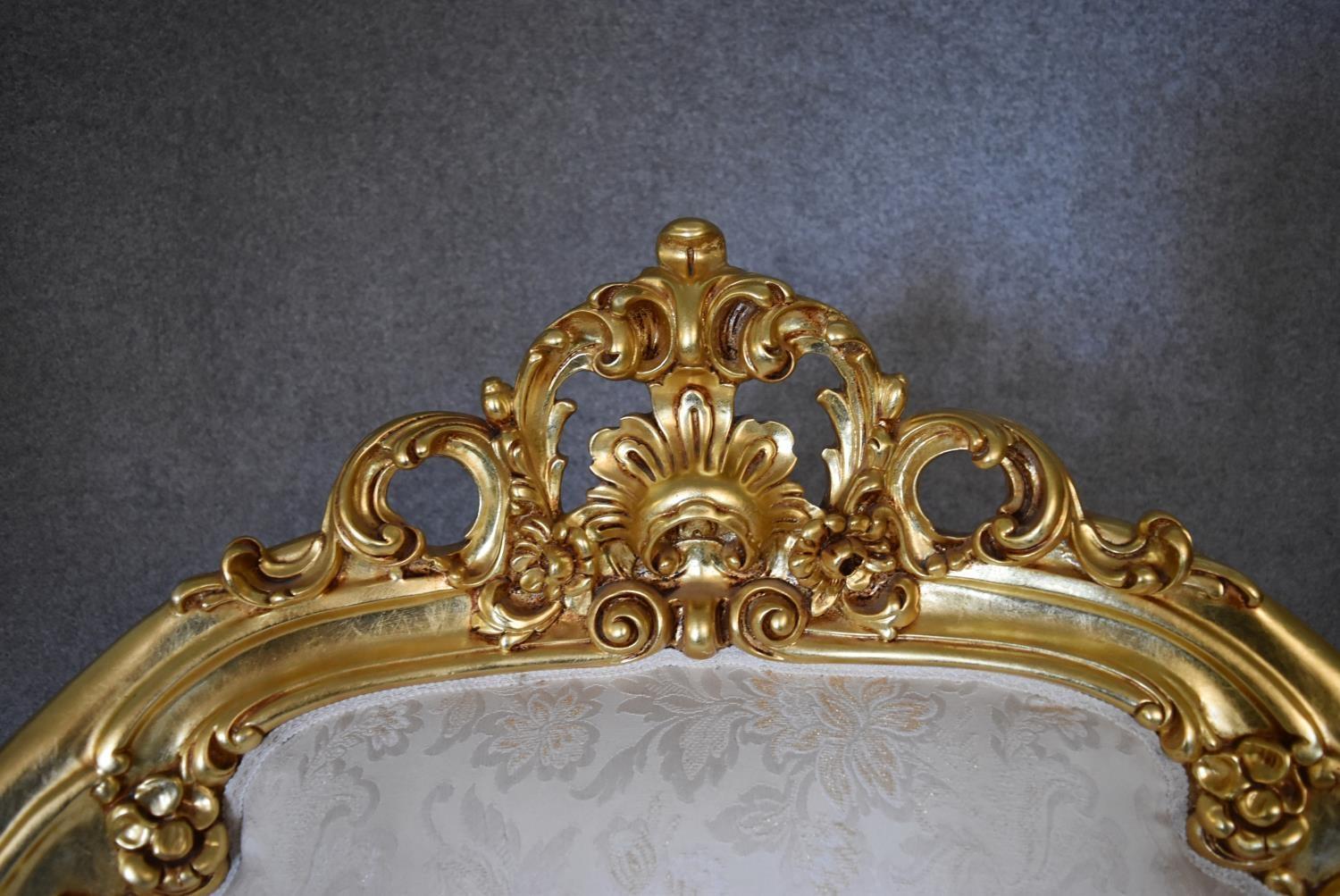 A large gilt framed armchair in the Baroque style with cream fabric upholstery. H.110 x 85 x 50cm - Image 3 of 4