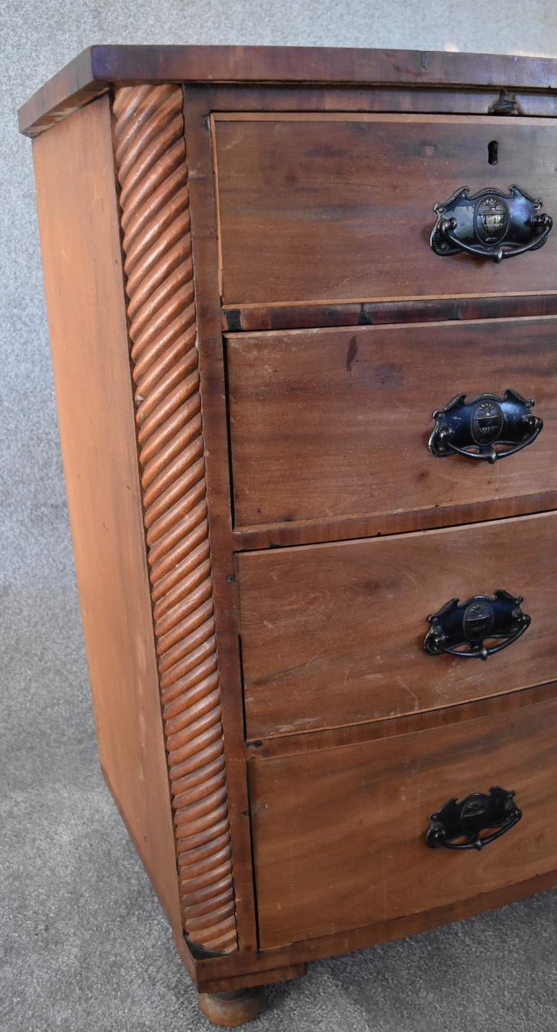 An Victorian mahogany bowfronted chest of two short over three long drawers flanked by spiral - Image 3 of 4