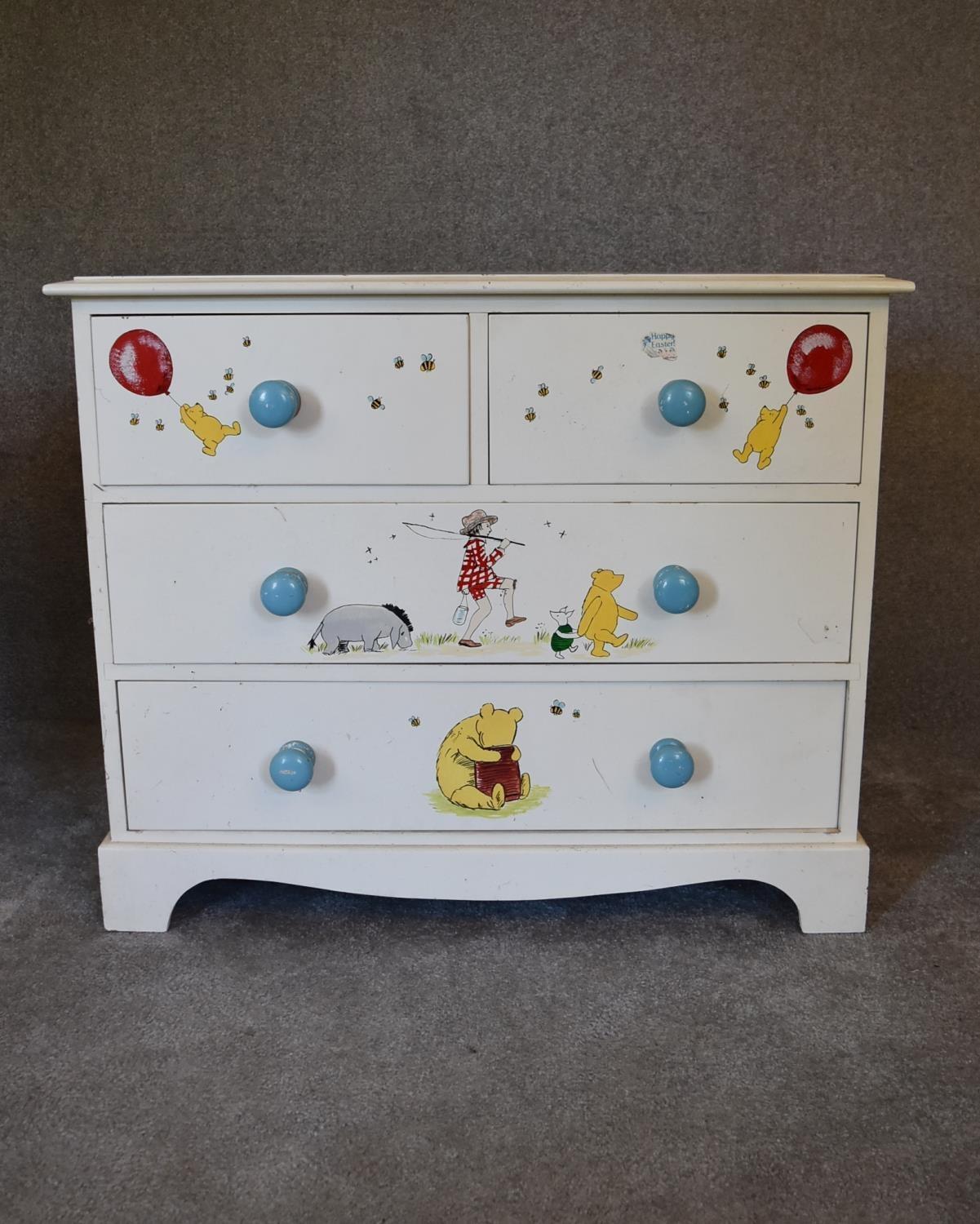 A pair of white painted pine chest of drawers with two short over two long drawers. Decorated with - Image 2 of 12