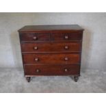 A Victorian mahogany mahogany chest of two short over three long drawers on turned supports. H 103 x