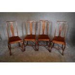 A set of four Georgian style beech dining chairs on cabriole supports. H. 102 x 45cm