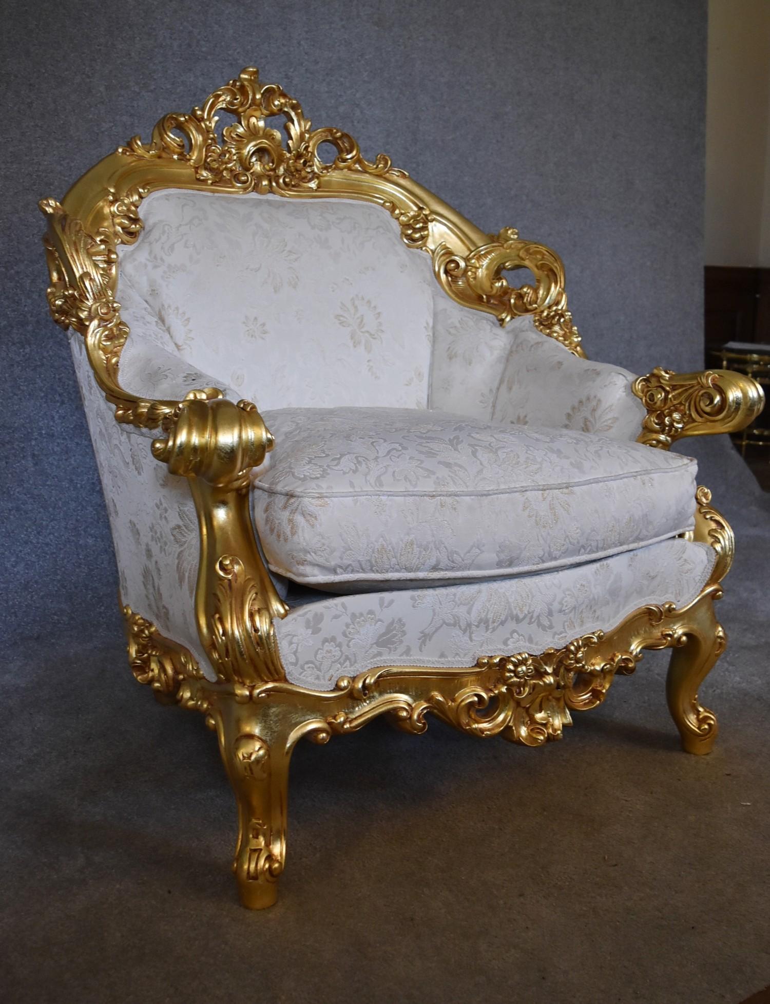 A large gilt framed armchair in the Baroque style with cream fabric upholstery. H.110 x 85 x 50cm - Image 2 of 4