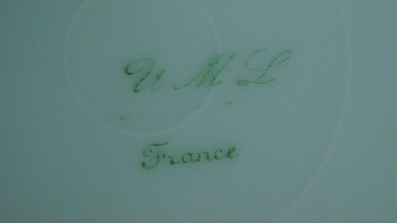 A collection of French hand painted plates with gilded detailing. - Image 11 of 11