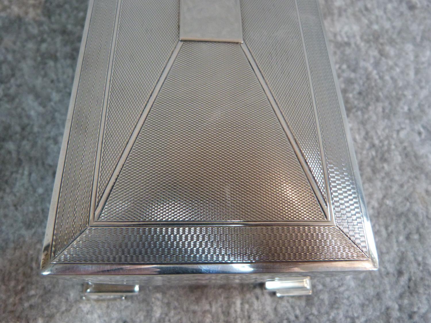 A silver cigarette box with engine turned decoration and two plain rectangular cartouches. - Image 9 of 9