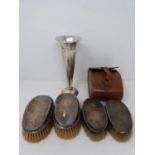 A silver trumpet vase and two pairs of silver backed gentleman's brushes. One set of brushes with