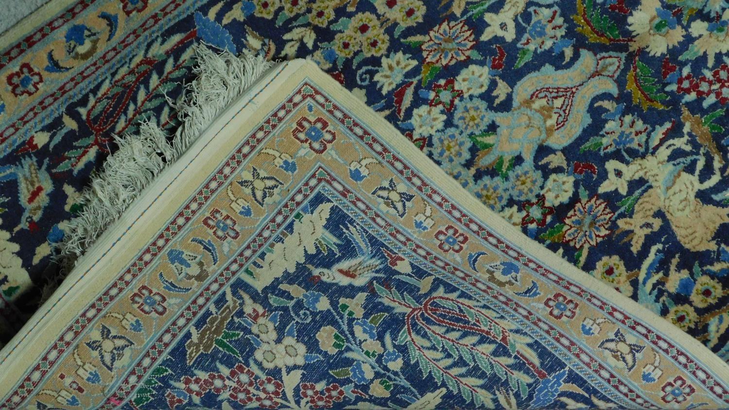 A floral runner depicting a wildlife scene on a midnight blue field within corresponding borders - Image 4 of 4