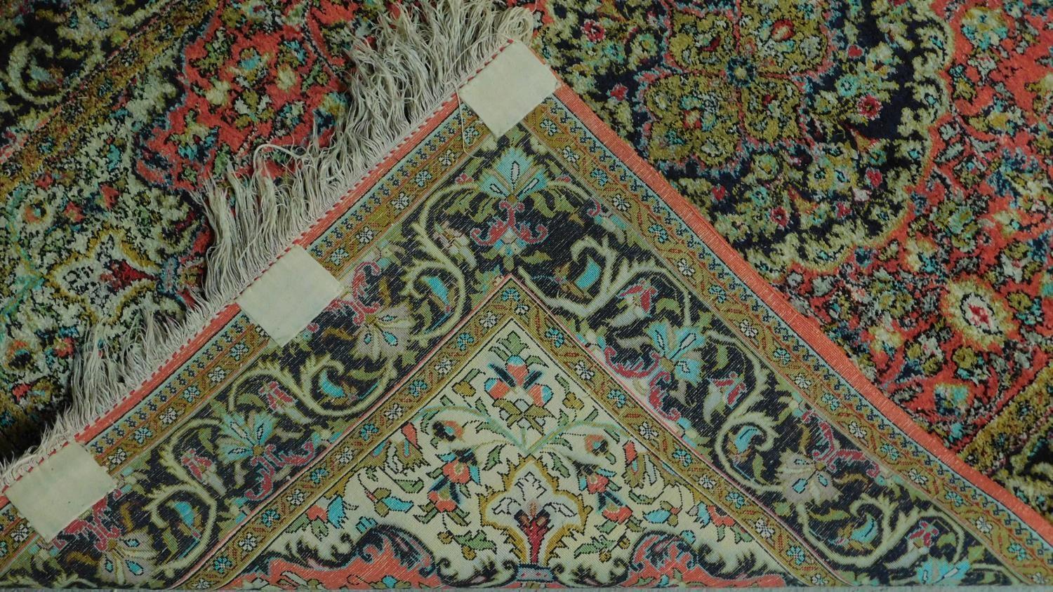 A Persian Sarouk Style rug, the central double pendant medallion with repeating petal motifs, on - Image 4 of 4