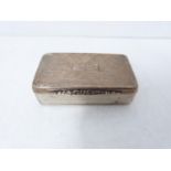 Georgian silver snuff box with engine turned decoration and central rectangular cartouche, floral