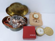 A collection of jewellery and two clocks. Jewellery includes two Bico chains, a gold plated LACAVERA