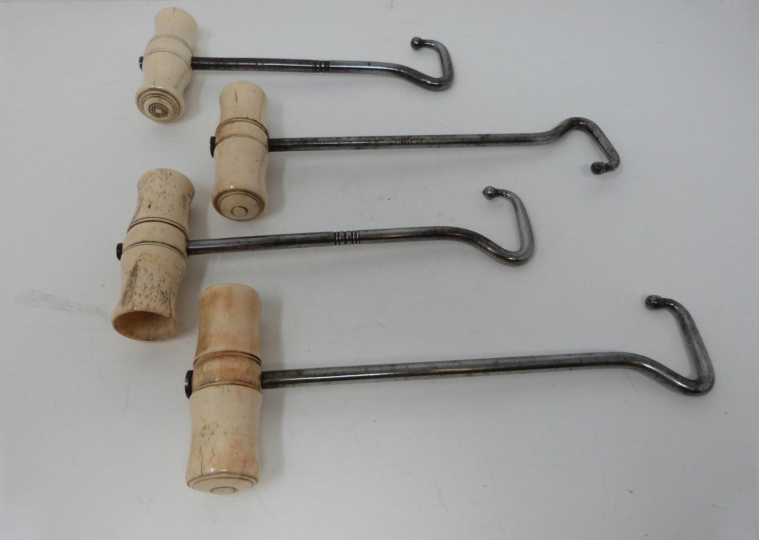 A collection of boot pulls and a glove stretcher, some with bone handles, one with deer antler - Image 2 of 7