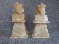 A pair of vintage carved alabaster pharoah head statues on plinths. H 27