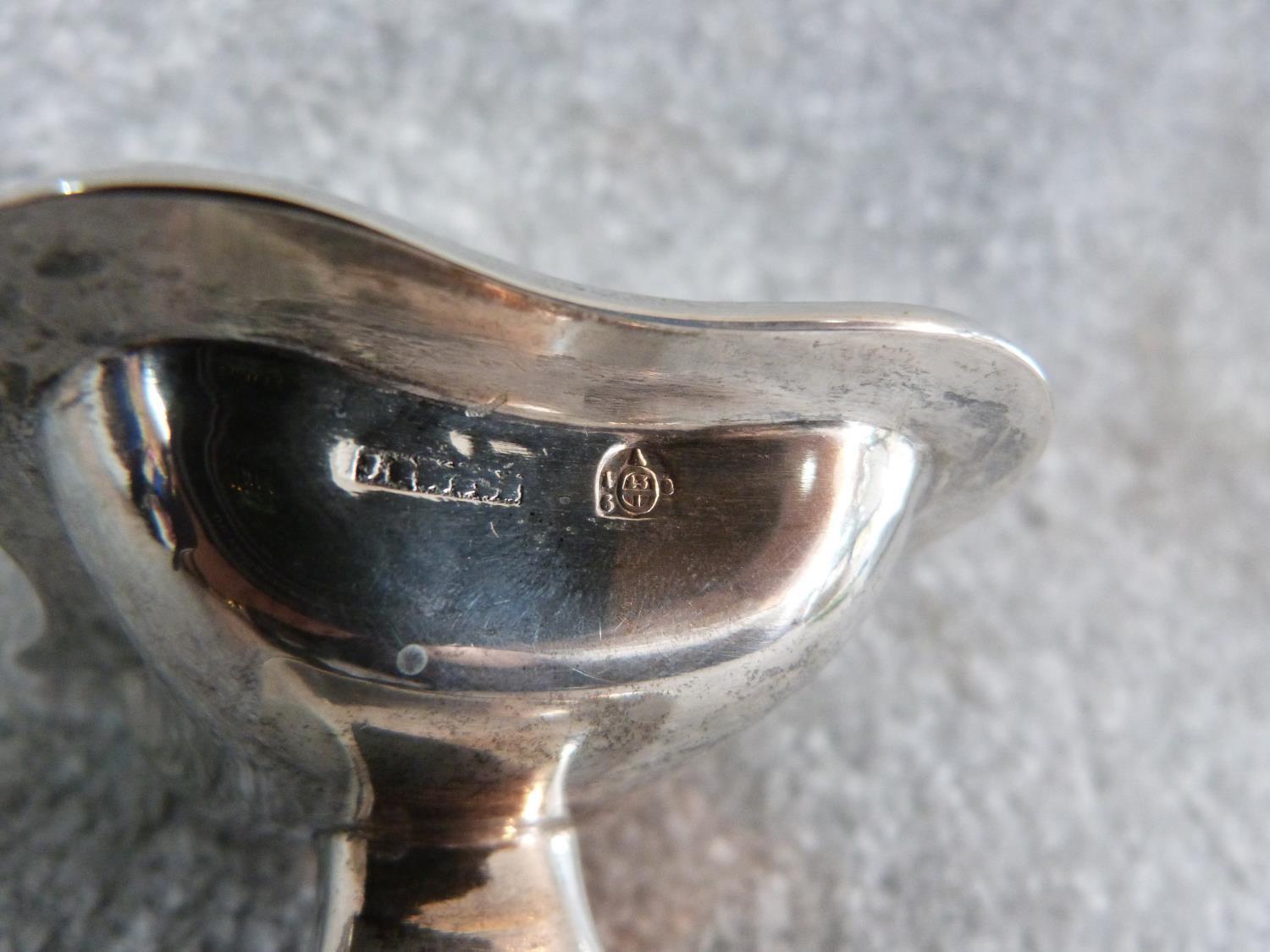 A gilded Austrian silver salt dish, with monogram and Austrian hallmarks and makers mark. H 8 x 4.5. - Image 4 of 4