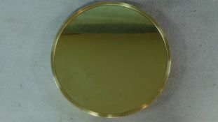 A vintage style golden framed yellow smoked glass mirror. 60x60cm