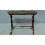 A 19th century mahogany shaped top centre table on stretchered cabriole supports. H.69 W.91 D.45cm