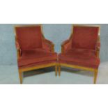 A pair Louis XVI style walnut framed armchairs raised on tapering reeded turned supports. H.89cm