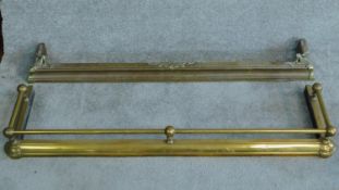 A 19th century brass fire kerb and another similar. W.132cm