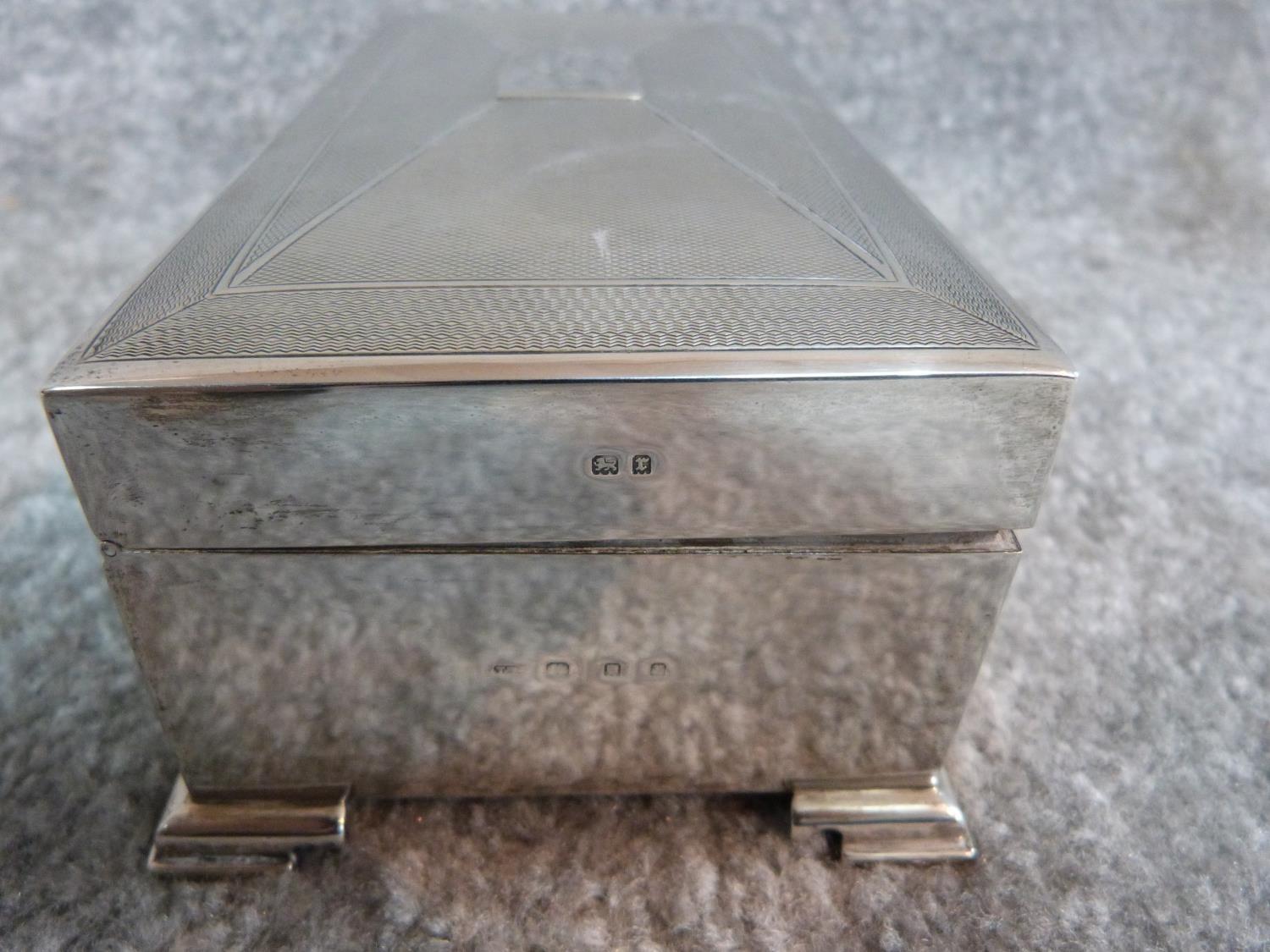 A silver cigarette box with engine turned decoration and two plain rectangular cartouches. - Image 7 of 9