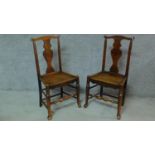 A pair of 19th century country elm dining chairs raised on stretchered turned supports. H.92cm