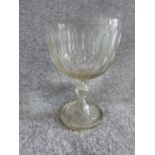 A large antique blown glass pedestal bowl/cup with oval cut design and star cut base. H 25.5