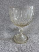 A large antique blown glass pedestal bowl/cup with oval cut design and star cut base. H 25.5