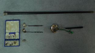 A collection of silver and silver plate items including a silver topped ebony cane, a Dutch silver