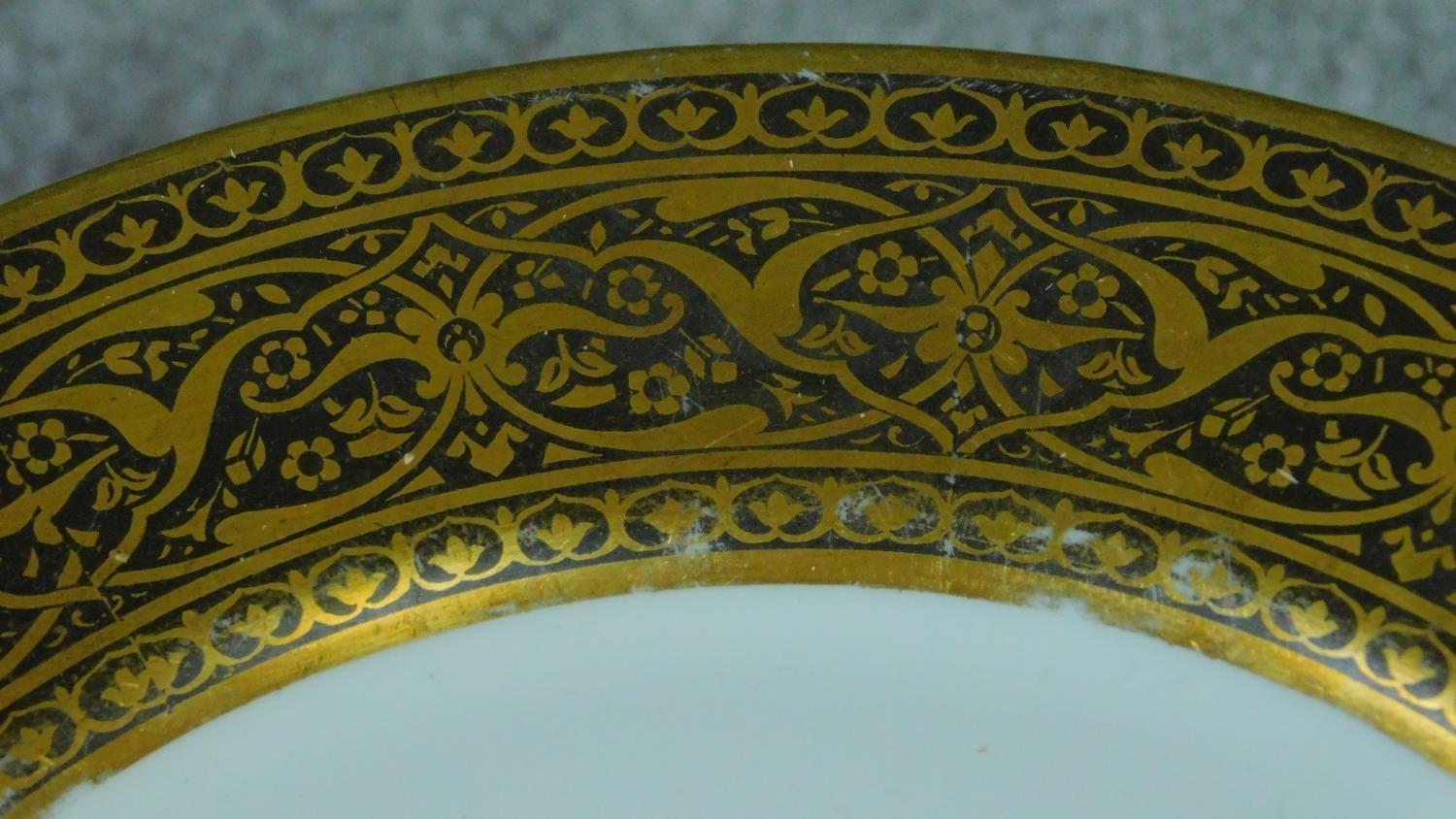 A collection of French hand painted plates with gilded detailing. - Image 3 of 11