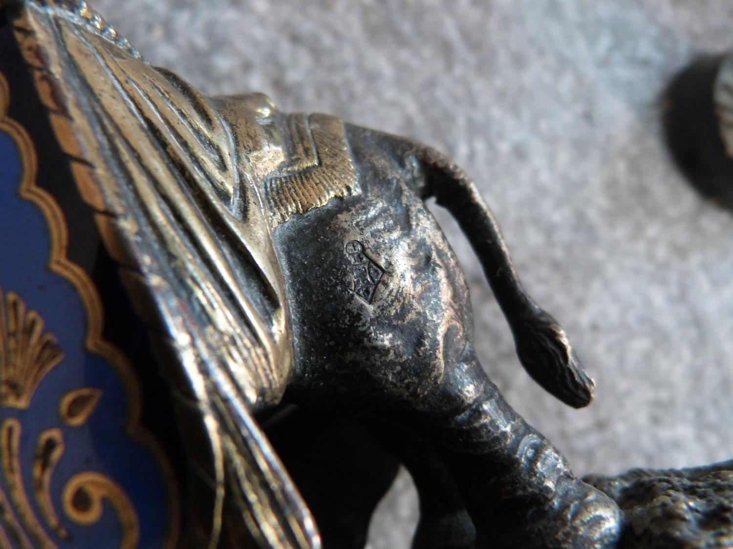 An antique silver plate and blue enamel elephant match holder with gilded details and an Indian - Image 11 of 16