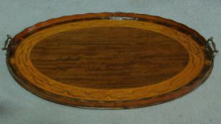 A 19th century mahogany with satinwood and olive wood inlay tray with brass handles. 73x52cm