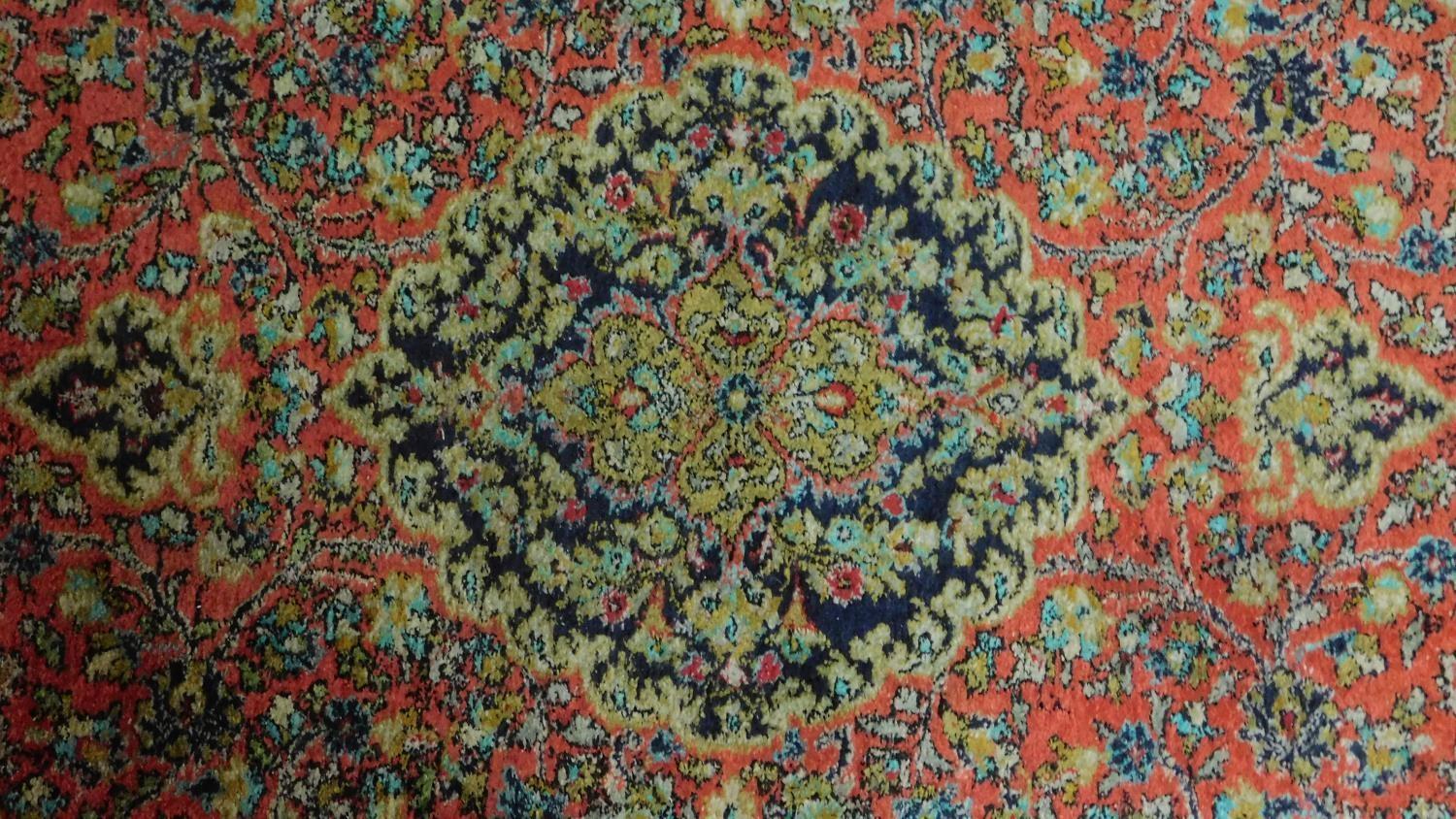 A Persian Sarouk Style rug, the central double pendant medallion with repeating petal motifs, on - Image 2 of 4