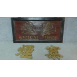A Chinese red and golden sign reading 'Opium Den' together with two identical carved Chinese