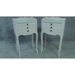 A pair of white painted French provincial style bedside chests on cabriole supports. H.67 W.37 D.