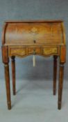 A Victorian style bureau desk raised on fluted turned supports. H.100 W.47 D.66cm