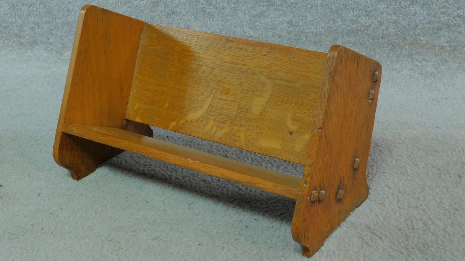 An oak Arts and Crafts book trough, signed by R. G. Collins to the bottom and an oak stool in - Image 5 of 6