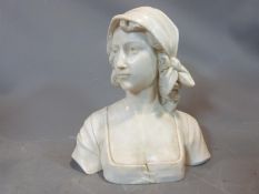 A 19th century Italian carved marble bust of a lady in a dress wearing a head scarf. Height 34cm.