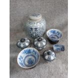 A collection of Oriental ceramics. Including a ginger jar, two bowls on stands and three lidded pots