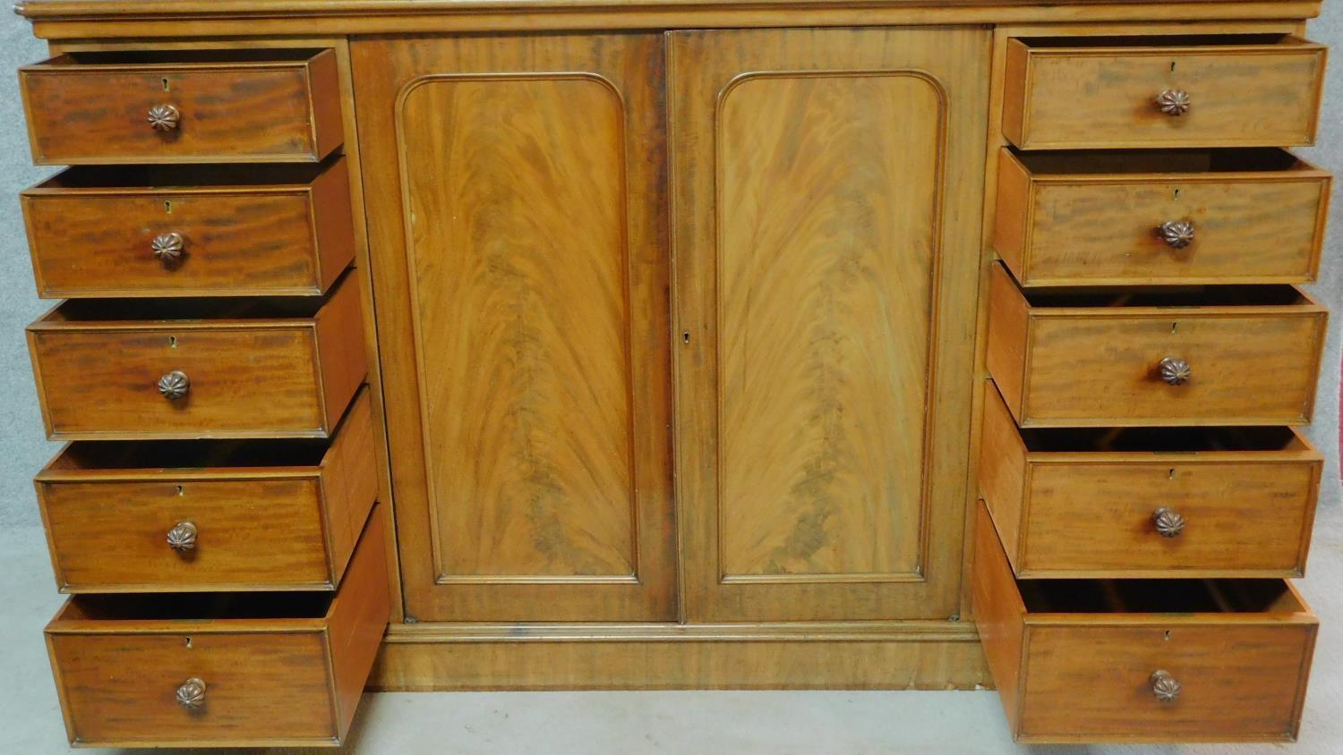 A Regency mahogany press cupboard with fitted central panel doors enclosing linen slides, flanked by - Image 3 of 10