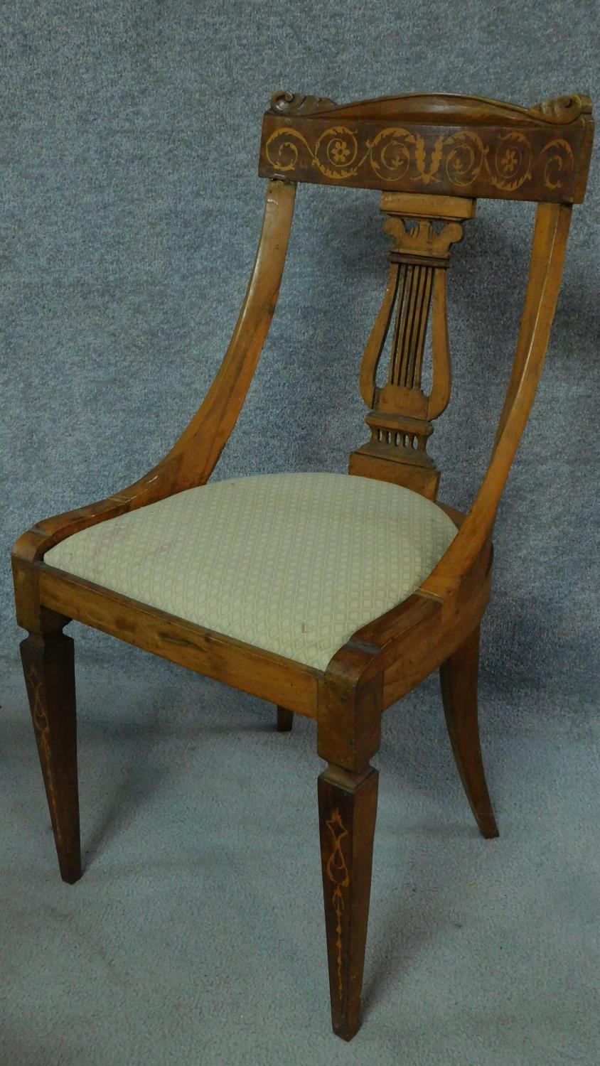 A set of four 19th century Continental walnut and satinwood inlaid chairs, lyre shaped backs on - Image 2 of 12