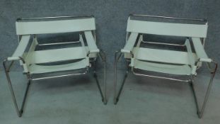 A pair of Vintage Wassily style leather chairs on chrome frame. H.72 W.79 D.66cm