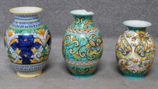 Three Italian majolica vases with colourful handpainted abstract designs. Inscribed to base. H.