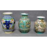 Three Italian majolica vases with colourful handpainted abstract designs. Inscribed to base. H.