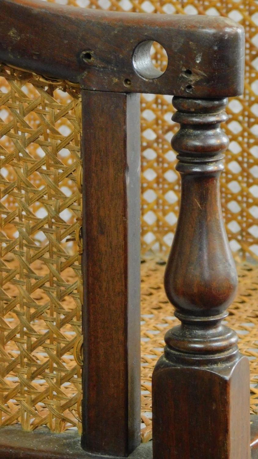 A Georgian mahogany child's bergere armchair on base with reeded swept supports. H.91cm - Image 4 of 5