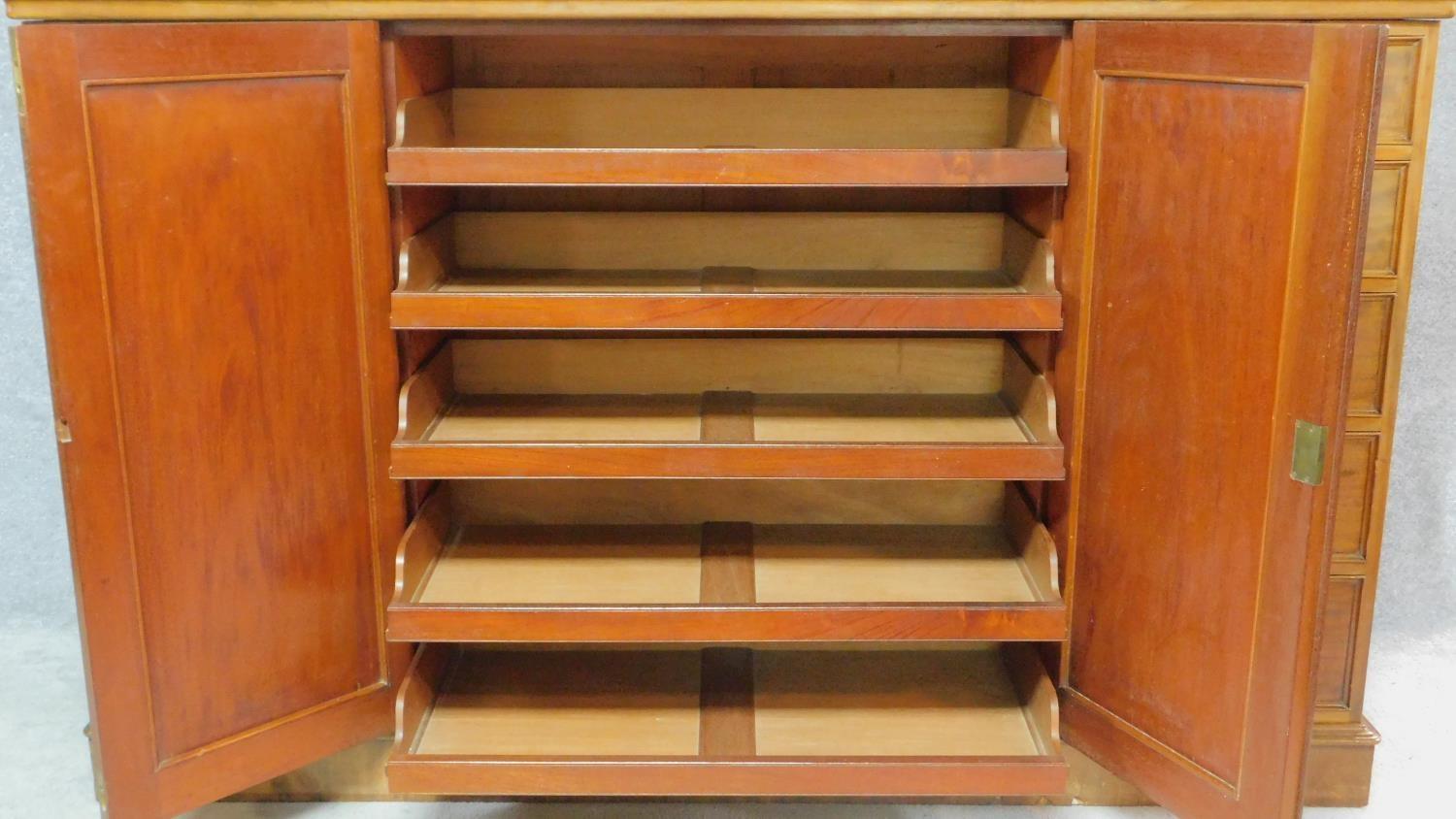 A Regency mahogany press cupboard with fitted central panel doors enclosing linen slides, flanked by - Image 2 of 10