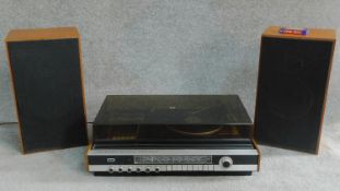 A vintage Garrard music centre together with a pair of vintage G.E.C. speakers. H.20 W.66 D.45cm