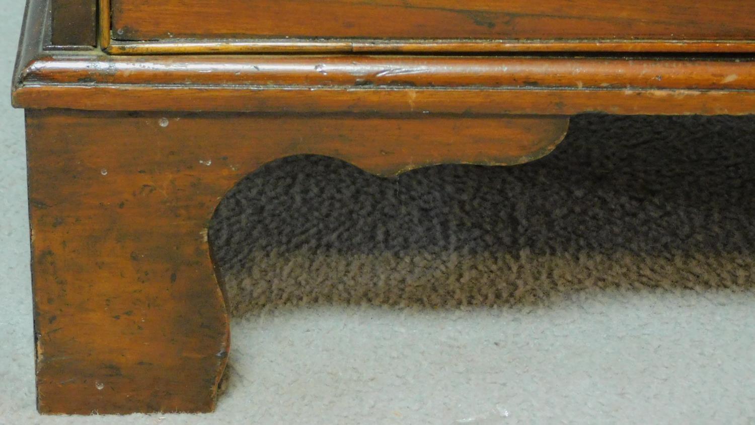 A Georgian mahogany chest of four long drawers fitted with brush slide on bracket feet. H.80 W.74 - Image 6 of 8